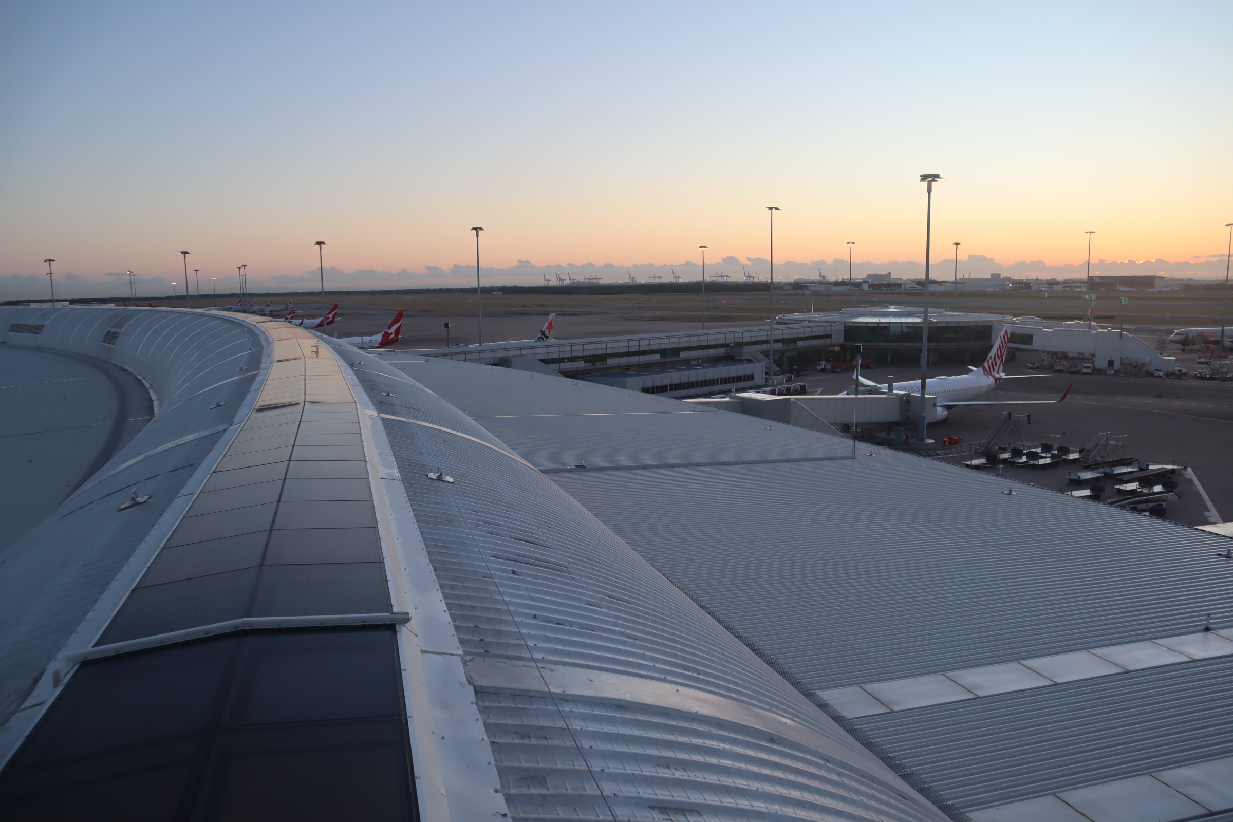 brisbane airport roof at sunset